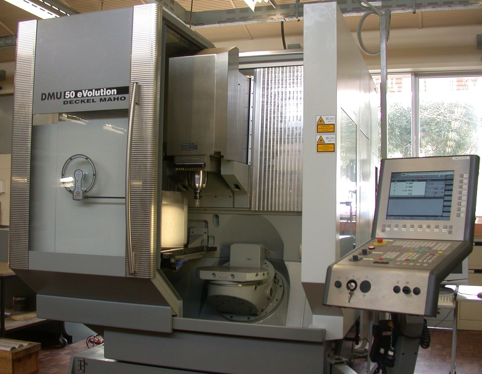 Modern CNC machining center in a precision cutting-tools factory